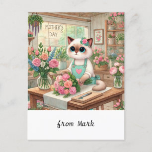 Een charmante kat regelt zorgvuldig mooie bloemen feestdagenkaart