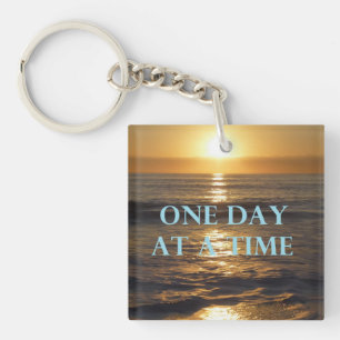 Eén dag per keer sleutelhanger