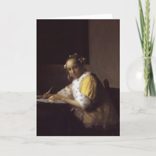 Een dame die schrijft kaart