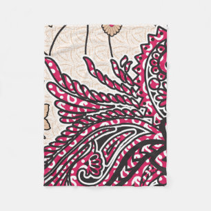 Een decoratief paisley-ontwerp met levendige rode  fleece deken