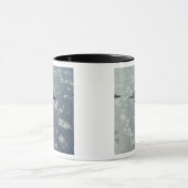 Een driepuntsformatie van F-22 Raptors Mok (Midden)