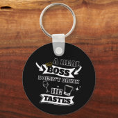 Een echte baas quote sleutelhanger (Achterkant)