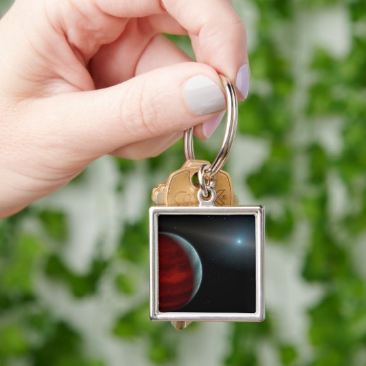 Een gasreus rond een witte dwergster. sleutelhanger (Hand)