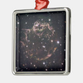 Een gedetailleerd uitzicht op de stoffelijke reste metalen ornament (Links)