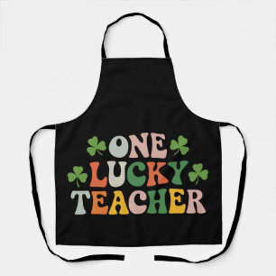 Een gelukkige leraar die retro St. Patrick's Day o Schort