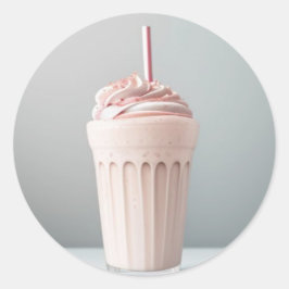 Een glas aardbeienmilkshake ronde sticker