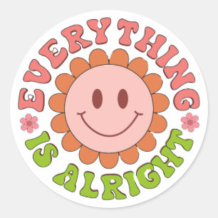 Een glimlachend gezicht met een bloem en de woorde ronde sticker