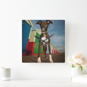 Een graatmeter die voor een paar strandhoeken staa vierkante klok (Huis)