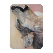 een grijze wolf in het wild die tegen zonsondergan magneet (Verticaal)