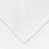 Een groen-witte logo met een gestileerd ontwerp fleece deken (Hoek)