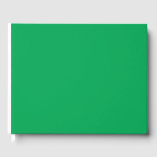 Een groene achtergrond met een gastenboek
