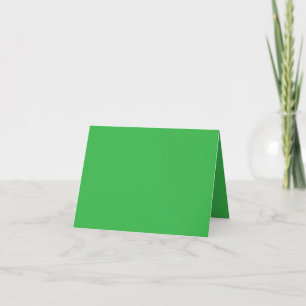 Een groene achtergrond met een witte rand bedankkaart