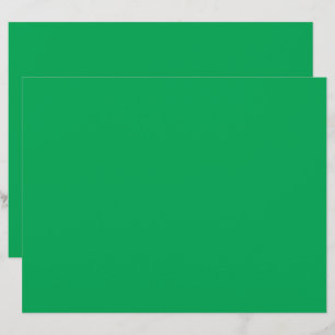 Een groene achtergrond met een witte rand briefhoofd