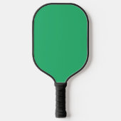 Een groene achtergrond met een witte rand pickleball paddle (Voorkant)