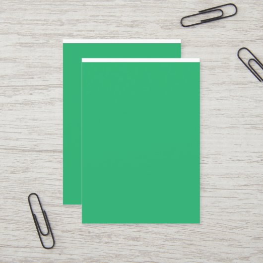 Een groene achtergrond met een witte rand visitekaartje (Voorkant / Achterkant in situ)