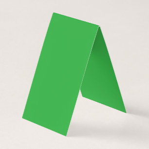 Een groene achtergrond met een witte rand visitekaartjes