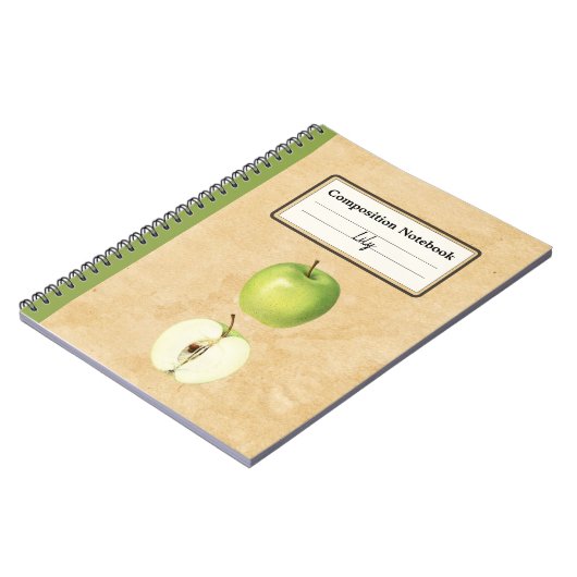Een groene appel en een half gepersonaliseerde com notitieboek (Linkerzijde)