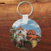 Een interessant huis sleutelhanger (Voorkant)