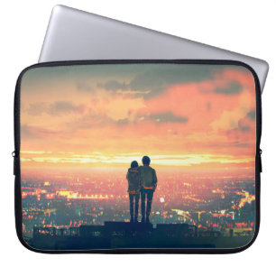 een jong koppel dat boven op het dak staat , kijkt laptop sleeve