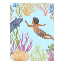 Een jonge jongen die vrijduikt in de Caraïben