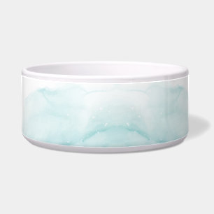 Een keramische kom met een zachte, pastel aqua wat