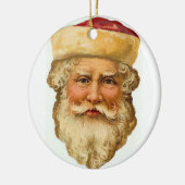 Een  kerstman keramisch ornament (Links)
