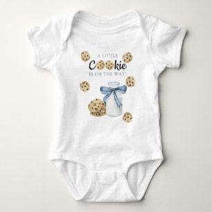 Een klein koekje is onderweg naar het Baby shower Romper