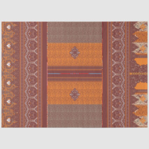 Een kruissteekpatroon in sinaasappel en bruin tissuepapier