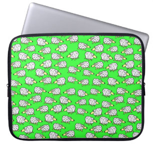 Een kudde schapen in een veld laptop sleeve
