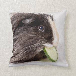 Een kussen met een schattig cavia-varken dat komko