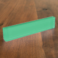 Een levendig groen blad met prominente nerven en e