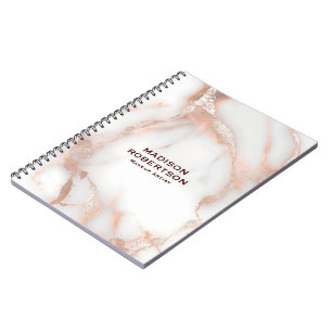 Een luxueuze roze-gouden marmeren achtergrond notitieboek