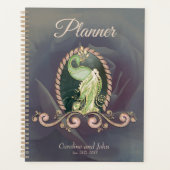 Een majestueuze pauw in goud en groen planner (Voorkant)