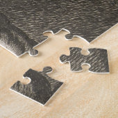 Een Man dat de benen van een ander Man opheft Legpuzzel (Zijkant)