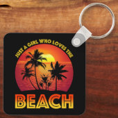 Een meisje dat van het strand houdt sleutelhanger (Achterkant)