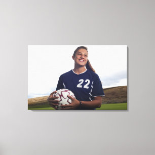 een meisje voetballer met voetbal canvas afdruk