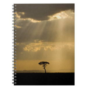 Een mystieke zonsondergang bij terugkeer naar kamp notitieboek