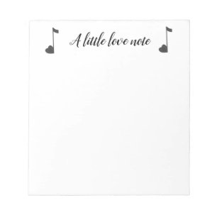 Een notebook met een liefdesnotitie notitieblok