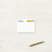 Een notitie van de leraar met naam post-it® notes (Op bureau)