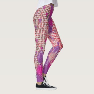 Een ontwerp van een paarse achtergrond met stippen leggings