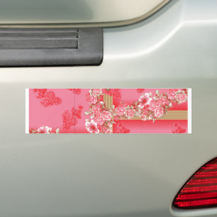 Een ontwerp van een roze en gouden achtergrond met bumpersticker
