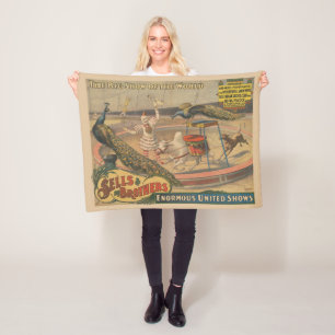 Een optredende zebu en pauw met clown trainer fleece deken