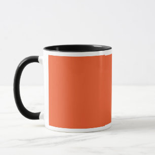 Een oranje achtergrond met een zwarte rand mok