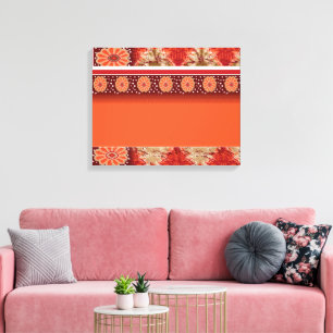 Een oranje en bruine pattereerde stof met een v canvas afdruk