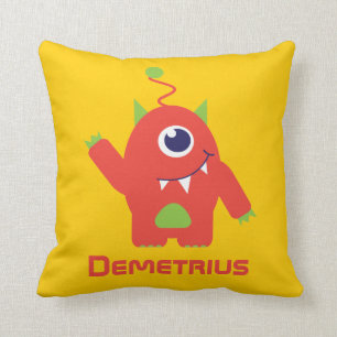 Eén oranje en gele kinder kussen met een oogzenuw