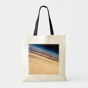 Een orbitale zonsondergang voor de kust van Baja C Tote Bag
