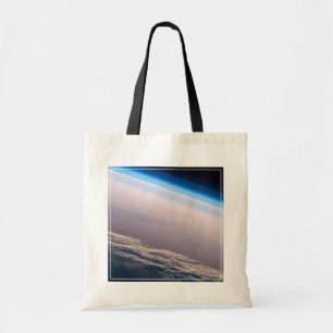 Een orbitale zonsondergang voor de kust van Cabo S Tote Bag