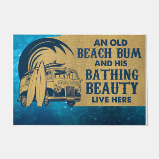 Een oud strand en zijn badschoonheid deurmat