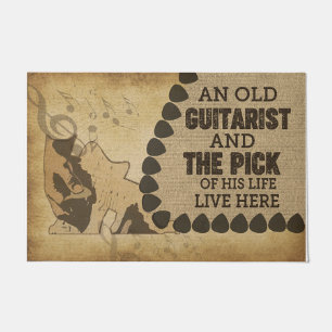 Een ouwe gitarist en de dief van zijn leven deurmat