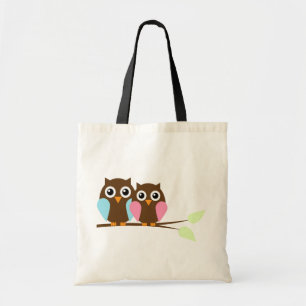 Een paar op een tak tote bag